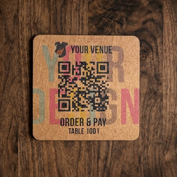 Wooden tile with QR code and text printed on the surface
